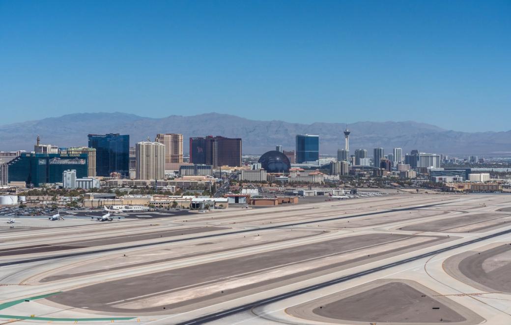 A runway in Las Vegas with the Strip skyline in the background. 