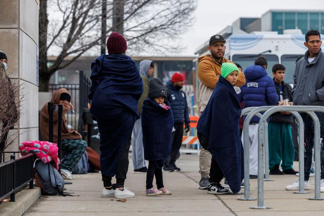A group of migrants outside at the city's migrant landing zone Jan. 10