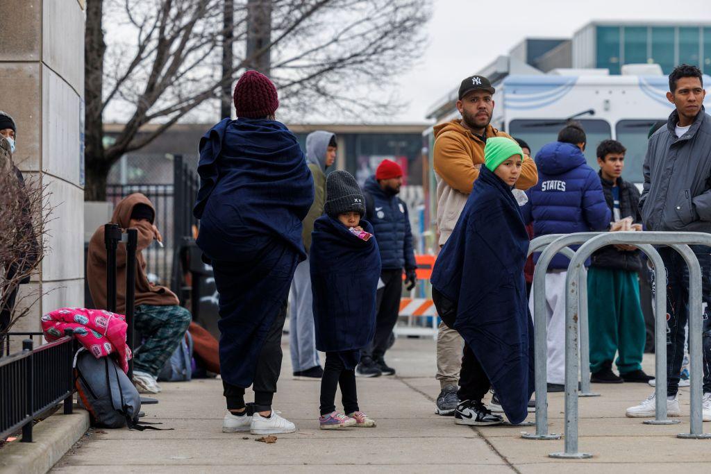 A group of migrants outside at the city's migrant landing zone Jan. 10
