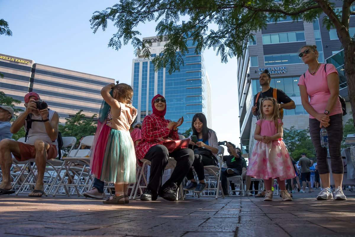 Families gather in celebration of World Refugee Day in 2024 at the Grove Plaza. (Mark Hewes / Idaho Office for Refugees)