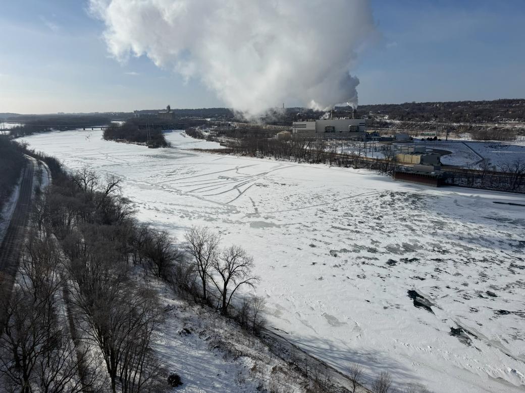 A wide shot of the Mississippi River frozen over