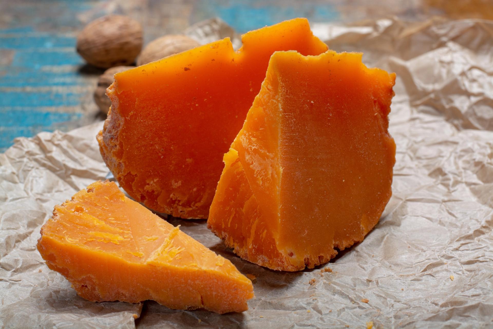 The French aged cheese Mimolette is the perfect Halloween orange. (Barmalini / Getty)