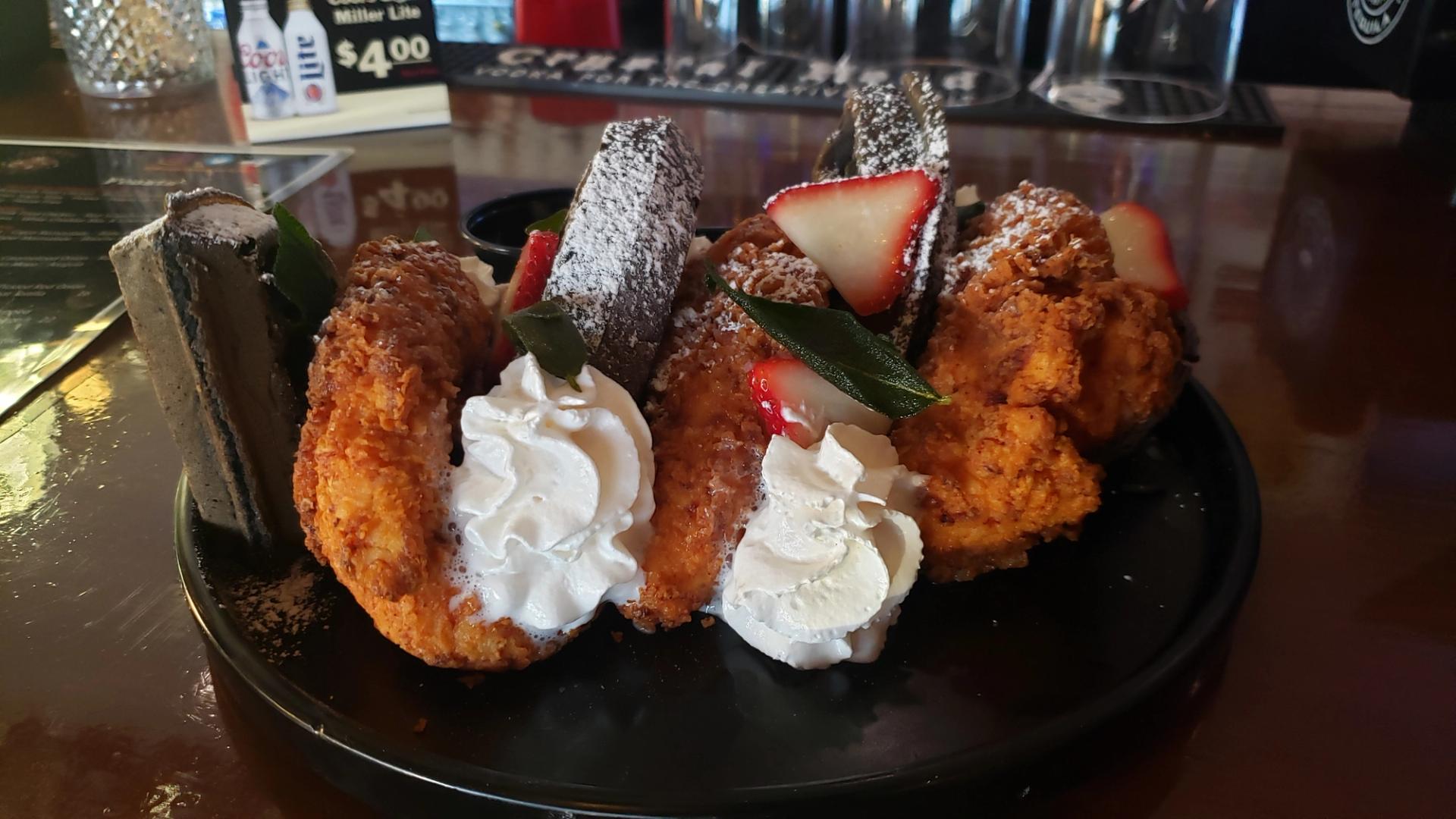 Chicken and waffles at Nightmare Cafe.