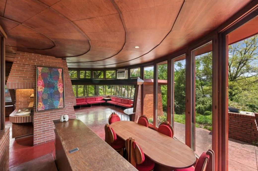 view inside a mid century modern house with large windows