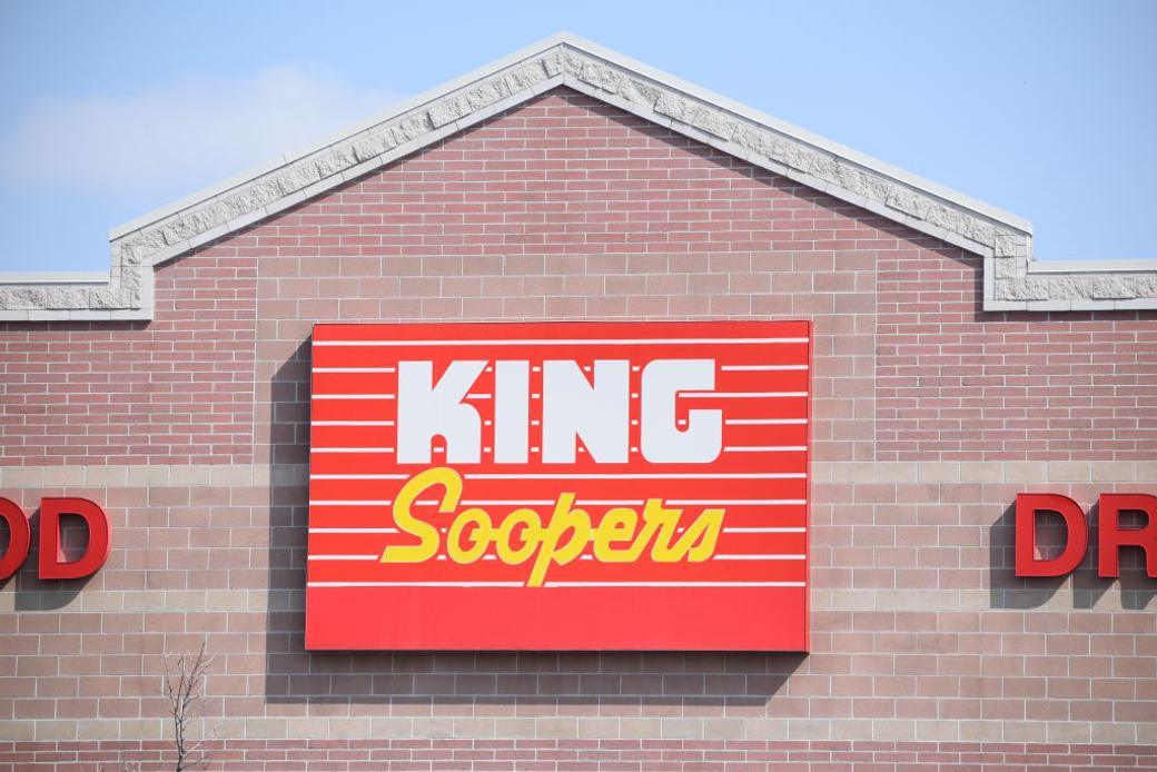 Red and yellow King Soopers grocery store sign up close