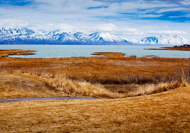 A picture of Utah Lake and the Wasatch Mountains, taken from Saratoga Springs.