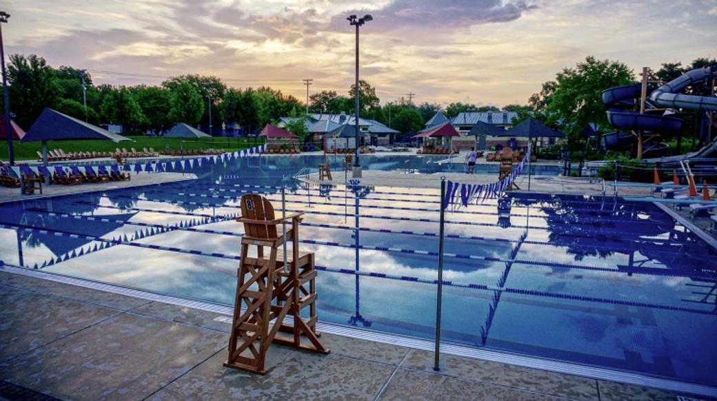 A swimming pool at sunrise.