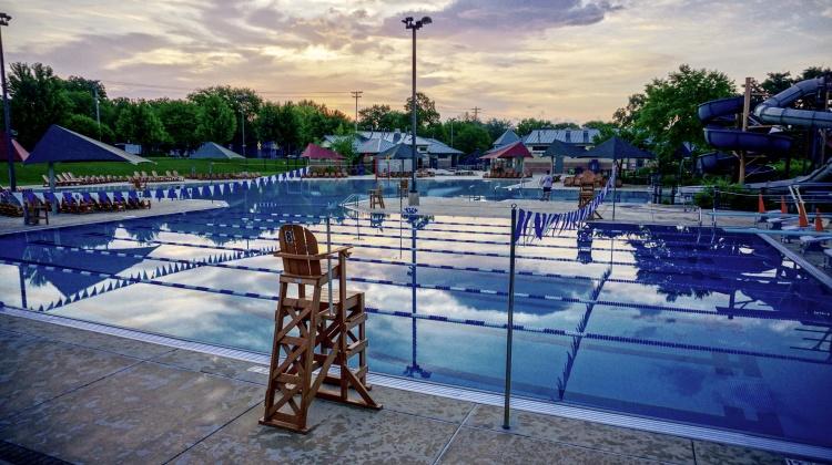 A swimming pool at sunrise.