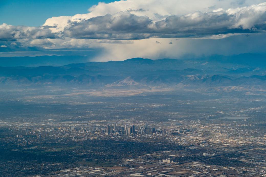 Storms brew over the city of Denver and the Front Range.