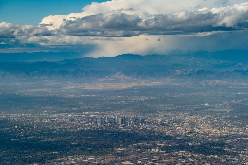 Storms brew over the city of Denver and the Front Range.