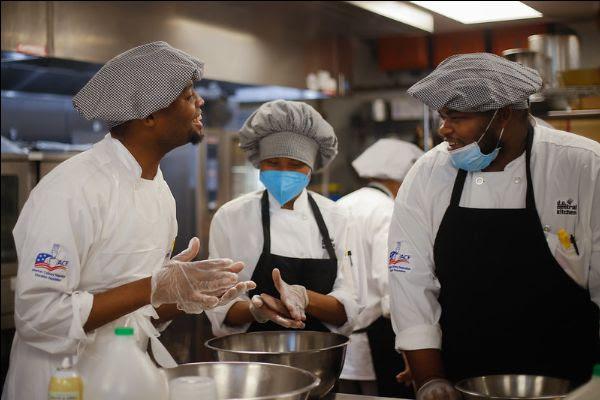 Job trainees participate in Chef Demo Day led by Chef Andrés Zuluaga. (Melissa Gold/ DC Central Kitchen)