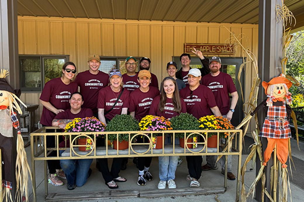 Display ad for Day of Service; Xcel energy team volunteering 