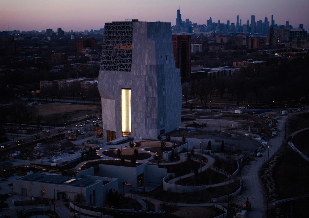 A building lit up during sunset