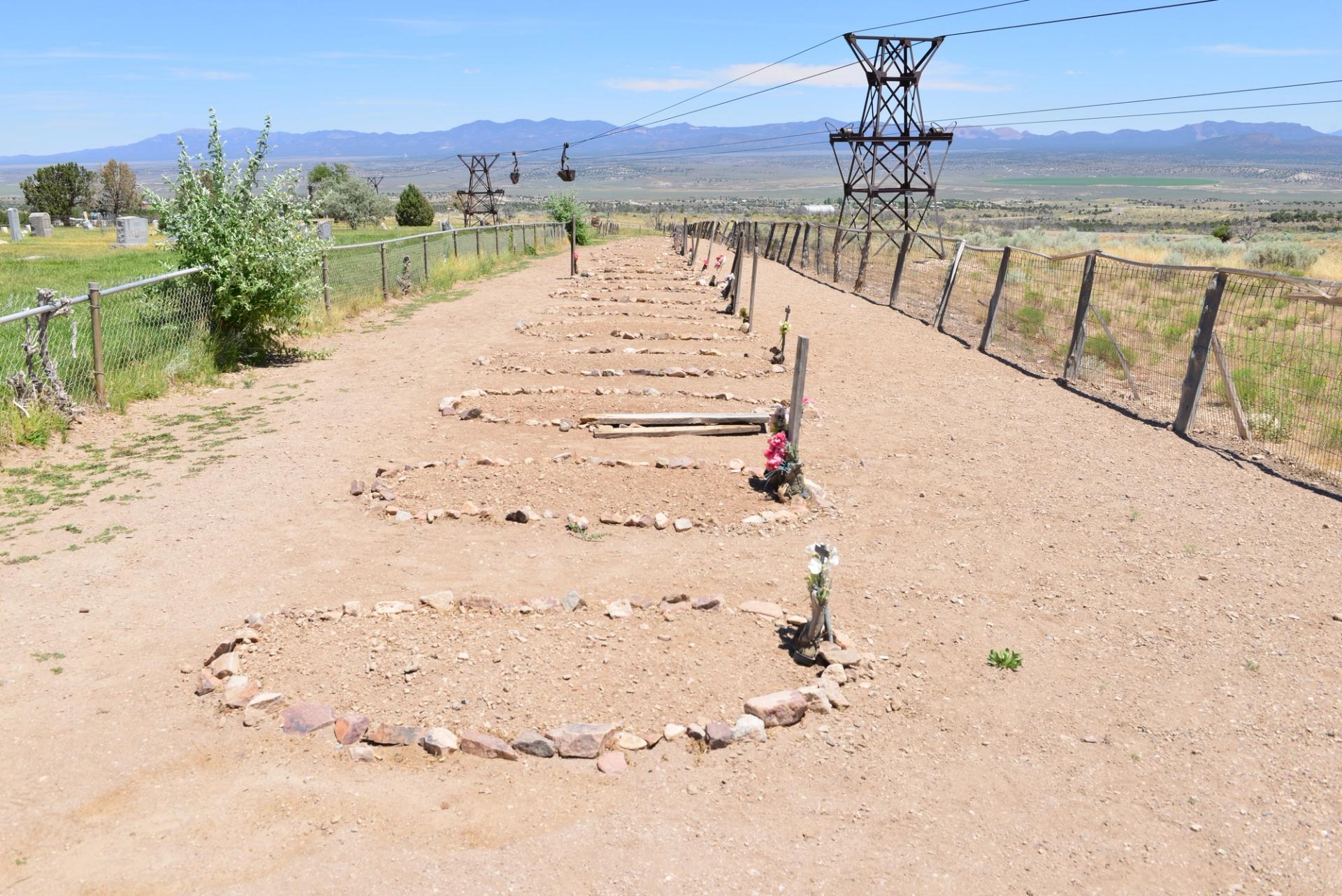 Boot Hill Cemetery with aerial mining tram overhead.