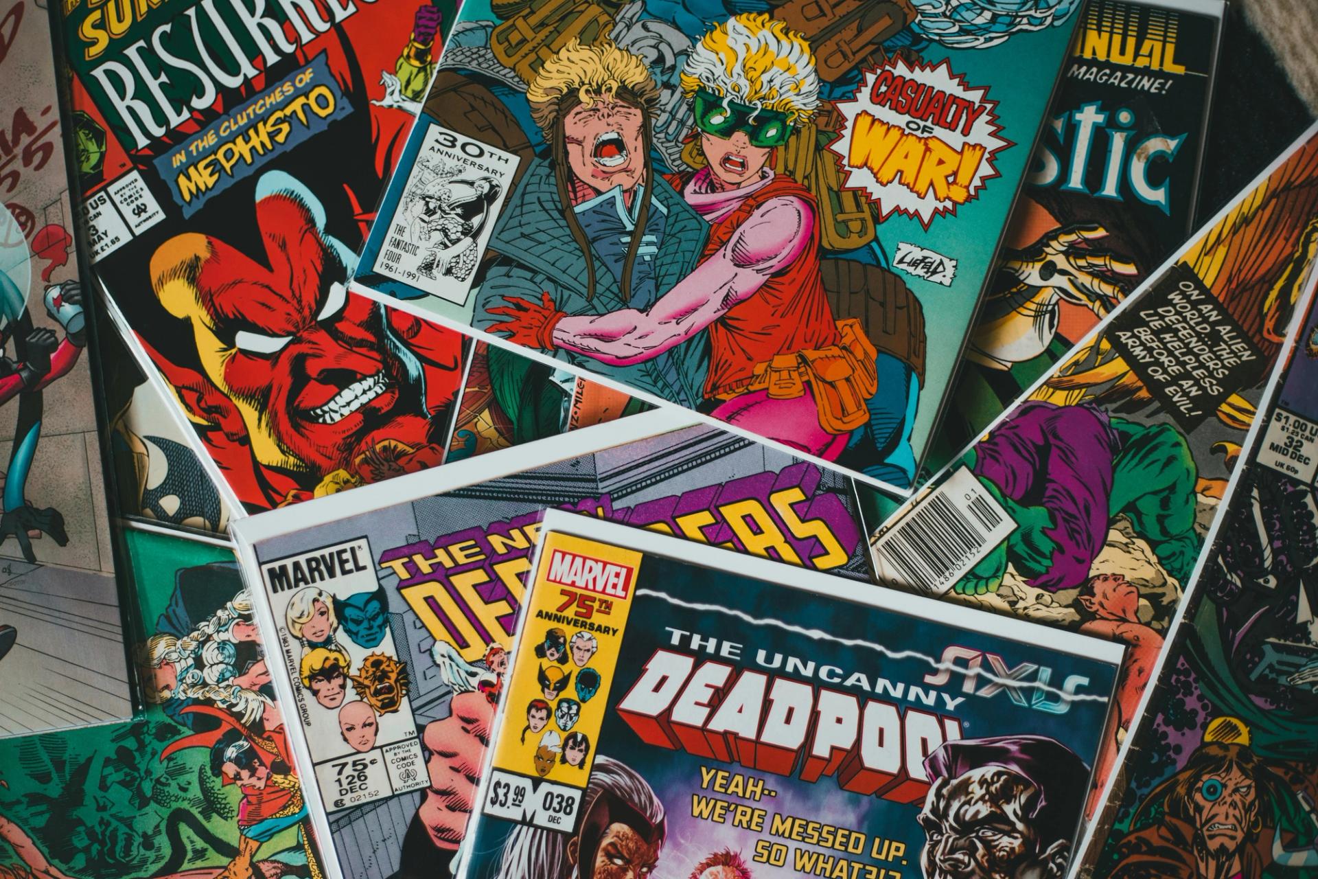 A stack of illustrated comic books.