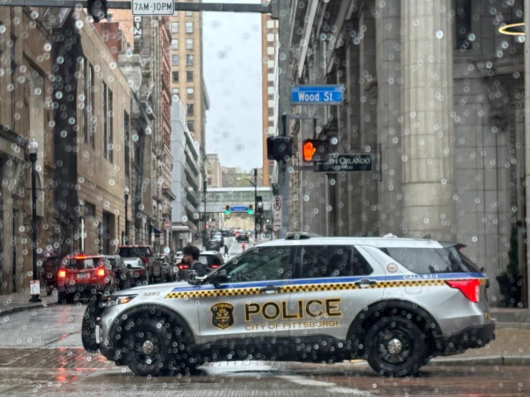 police car in the rain in Downtown
