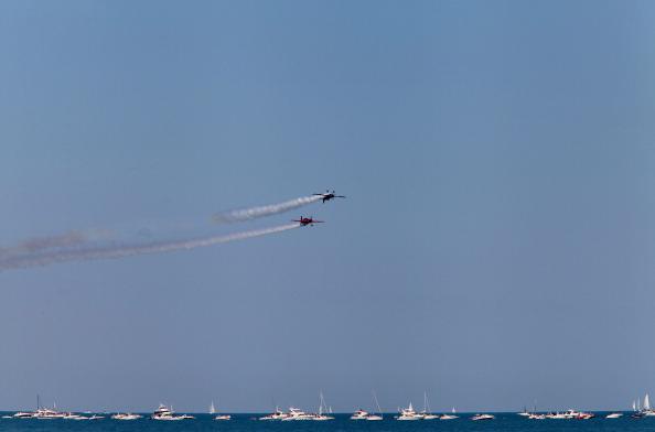 Two airplanes flying above Lake Michigan, Chicago, Illinois.