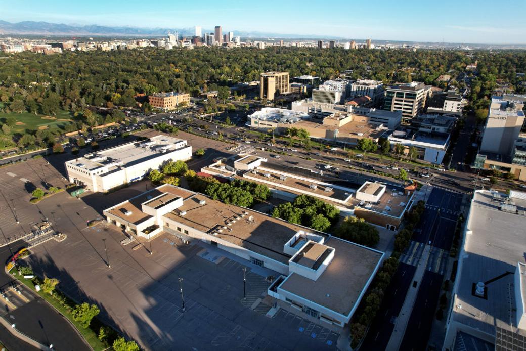 Aerial view of city with skyline in the background