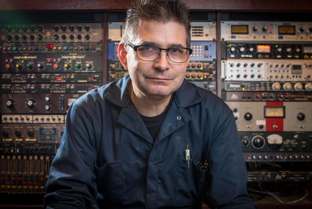 Steve Albini in front of audio recording equipment