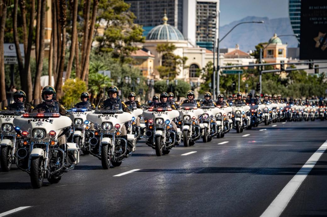 Police motorcycles driving down the Vegas Strip. 