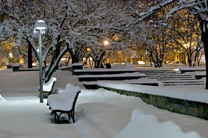 Bench and stairs at night after heavy snowfall in D.C.