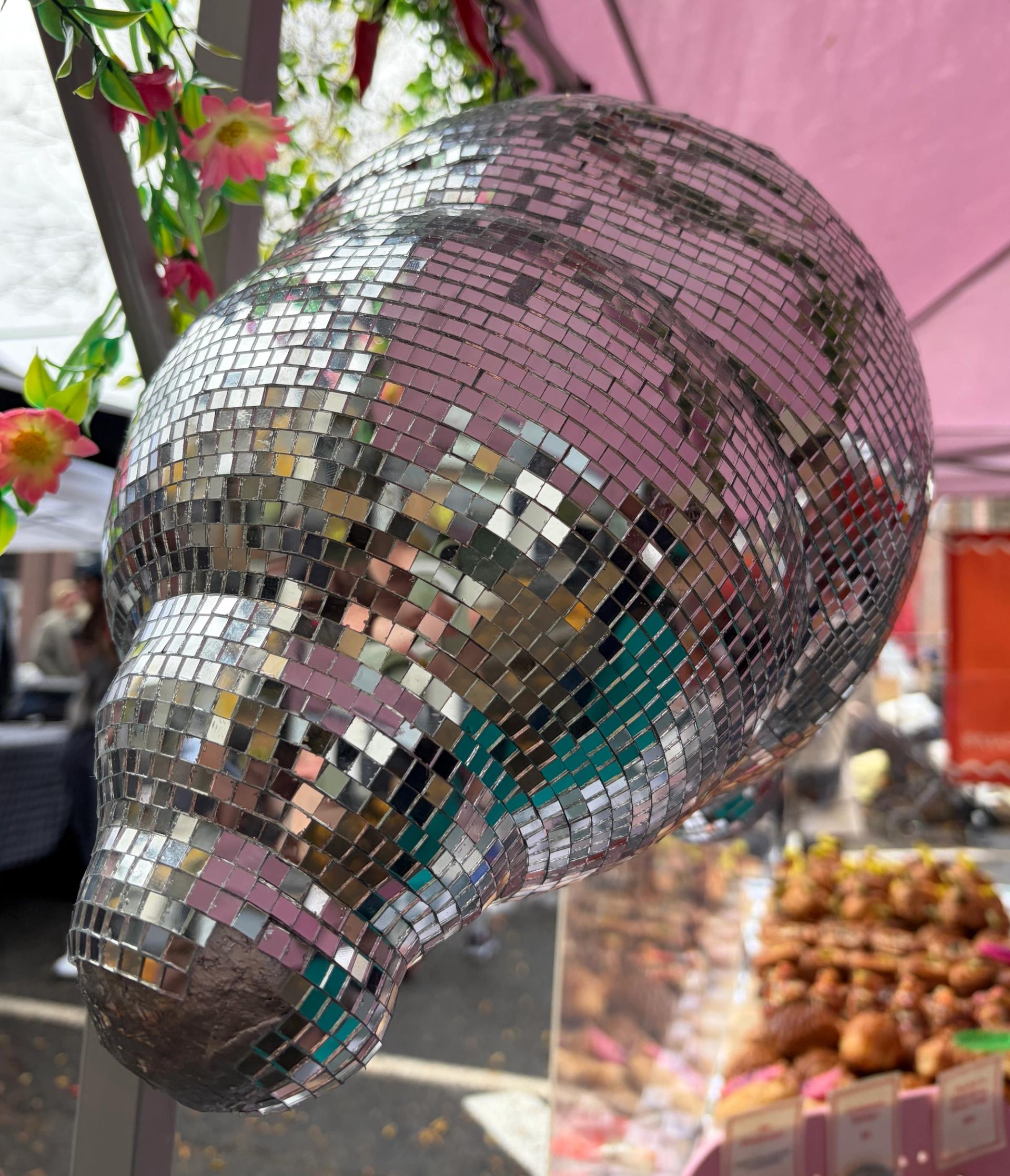 Disco croissant displayed at a farmers market booth