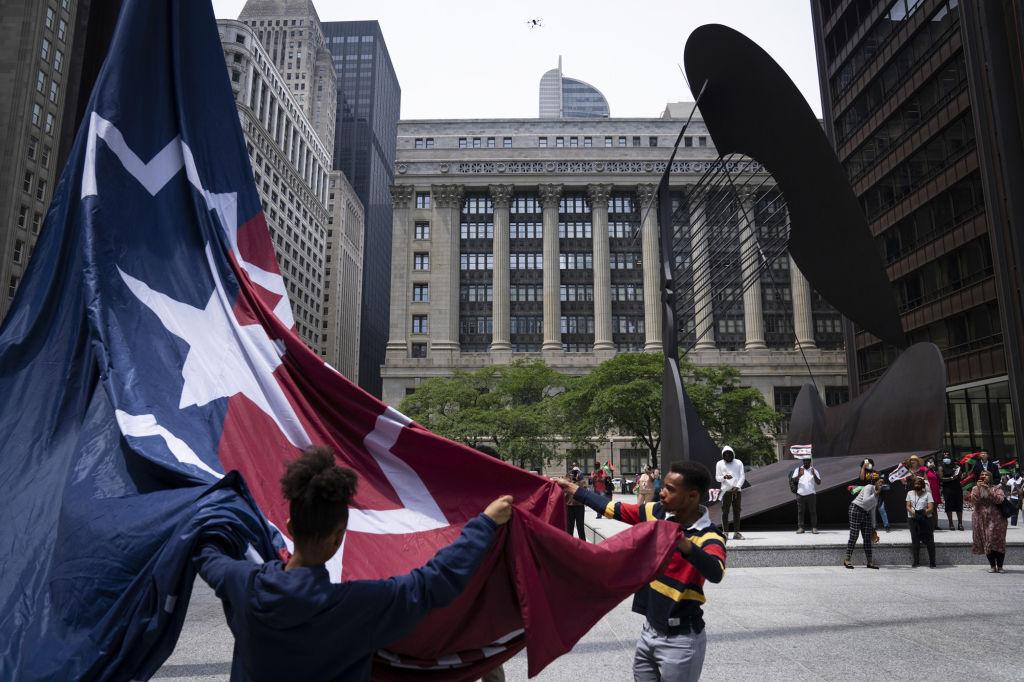 The Juneteenth flag during a ceremony at Richard J Daley Center Plaza in 2022
