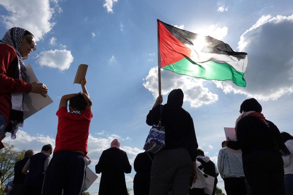 Members of the Muslim community hold a rally in Bridgeview to show support for Palestinians facing Israeli airstrikes in the Gaza Strip in 2021.