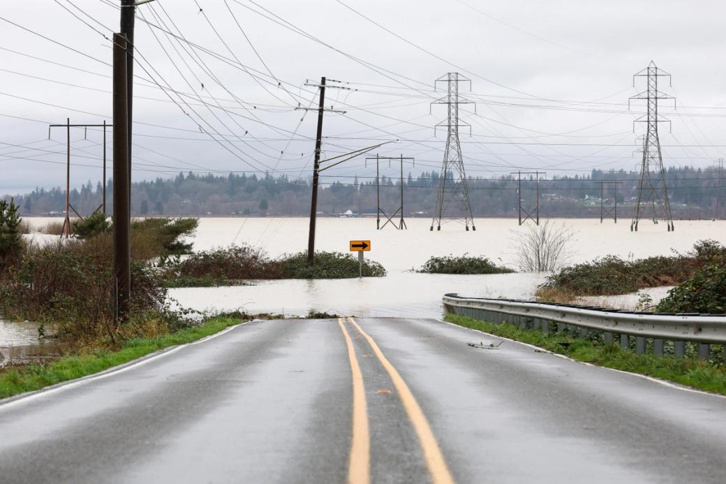 An image of a road being cut off by flooding