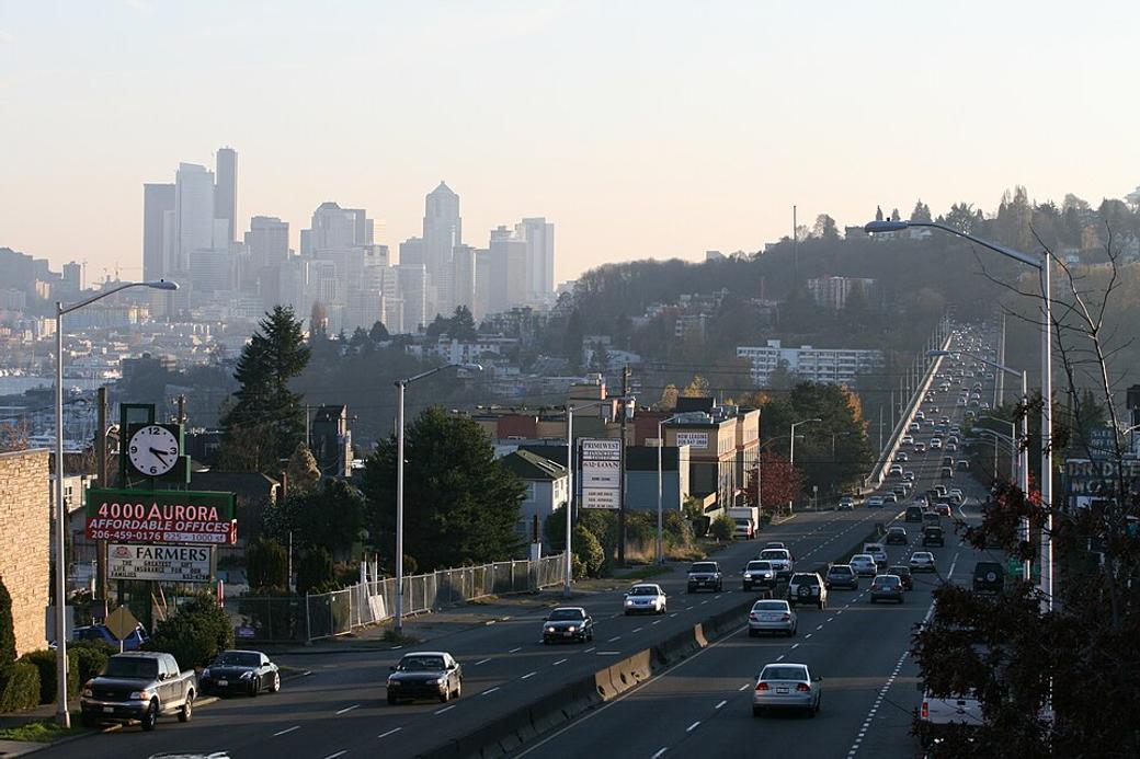 An image of Aurora avenue filled up with cars and the city of Seattle in the background