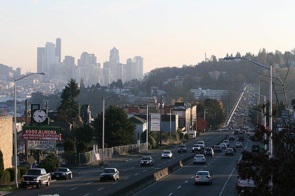 An image of Aurora avenue filled up with cars and the city of Seattle in the background
