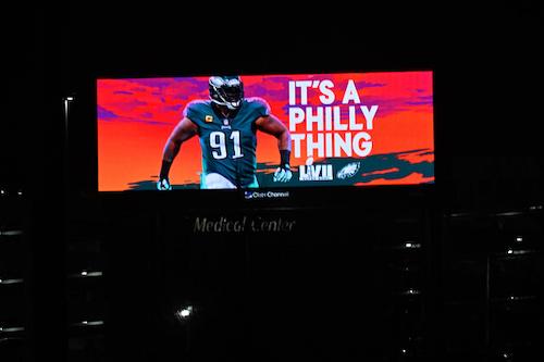 An electronic billboard displaying the “It’s a Philly Thing” slogan at the 2023 Super Bowl. (Mark Makela/Getty Images)