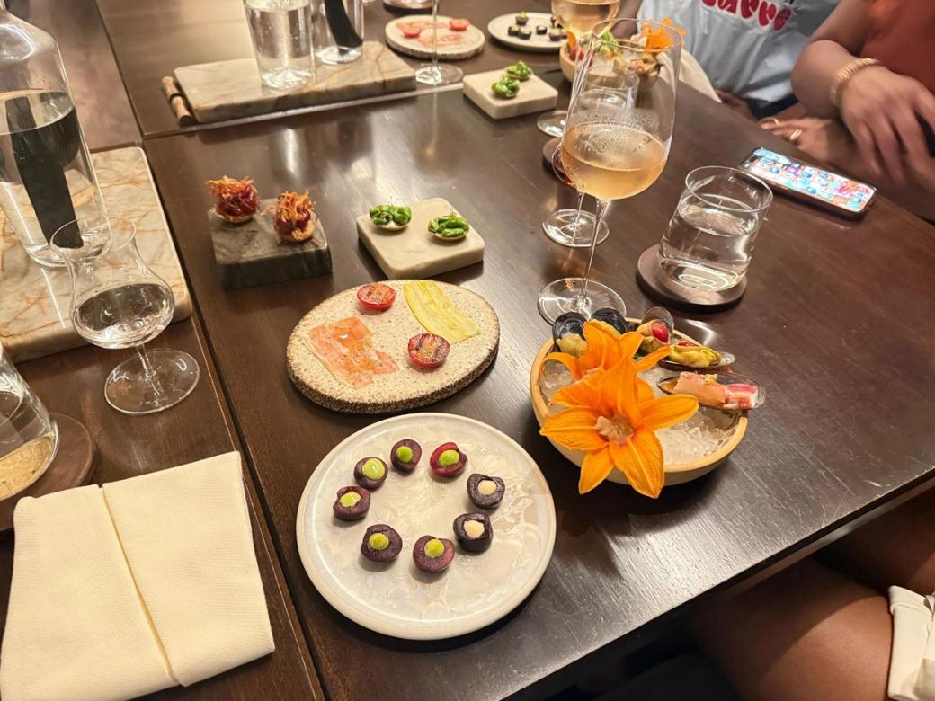 A table with an arrangement of different seafood dishes