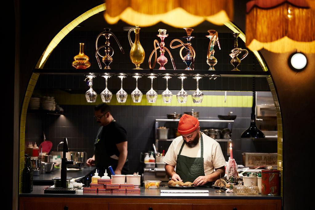 Chef Michael Rafidi puts the finishing touches on a dish at La' Shukran. (The Washington Post/Getty Images)