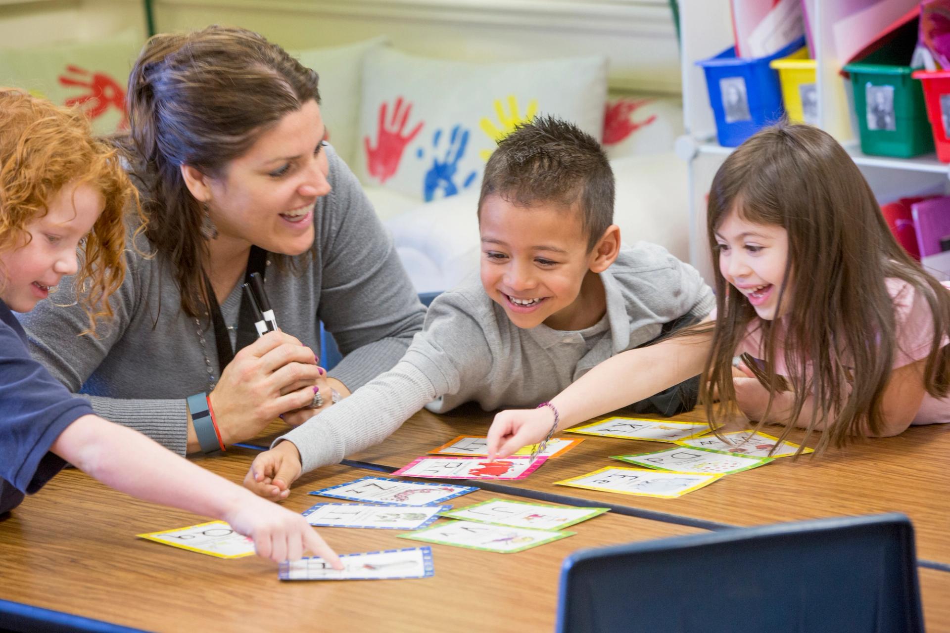 Photo of daycare worker with kids.