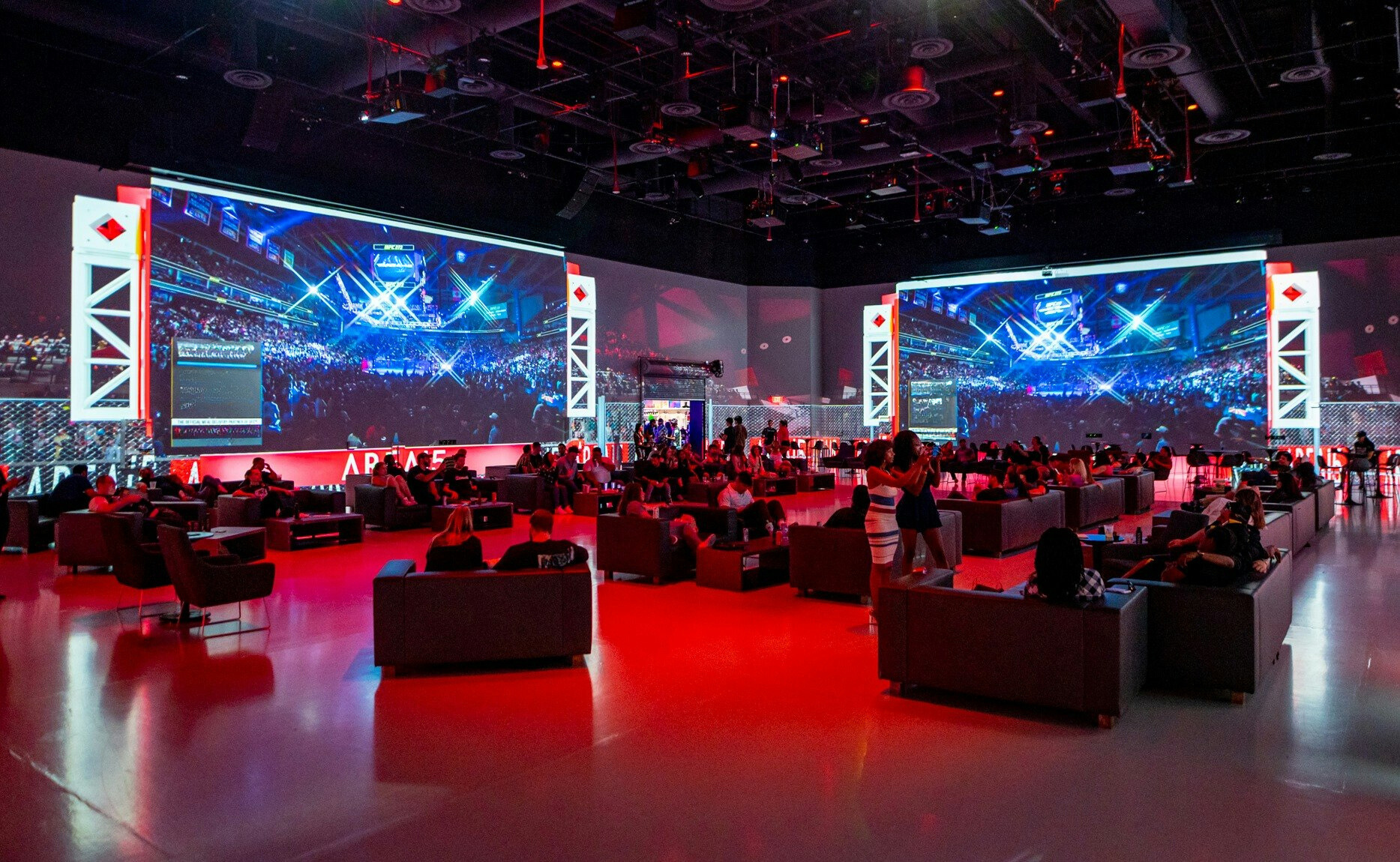An immersive viewing party, surrounded by large screens at AREA 15.