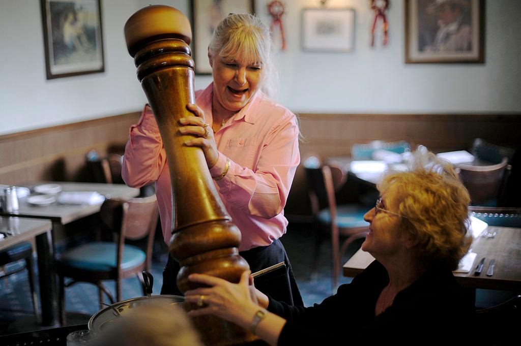 Kayo Mortensen, serves the Giant Peppermill to a diner at Emil-Lene's Sirloin House in 2010.