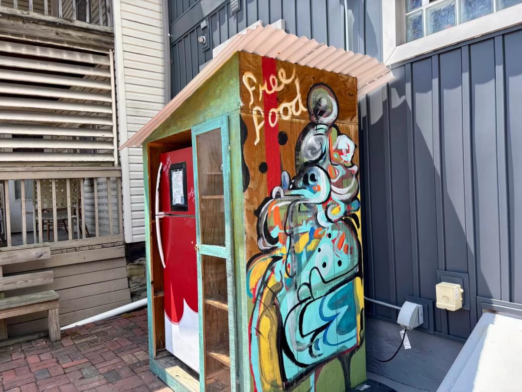 a homemade fridge outside a cafe in pittsburgh