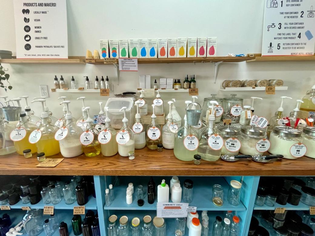 bottles of shampoo and detergent and other items for refill