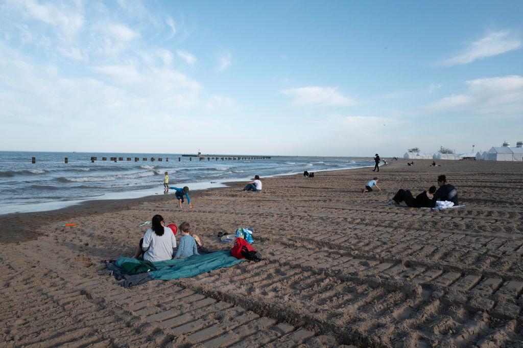 People at the lakefront as temperatures climbed to 71 degrees Monday