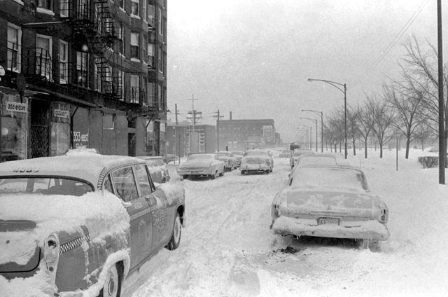 Cars covered in snow in Chicago during the 1967 blizzard