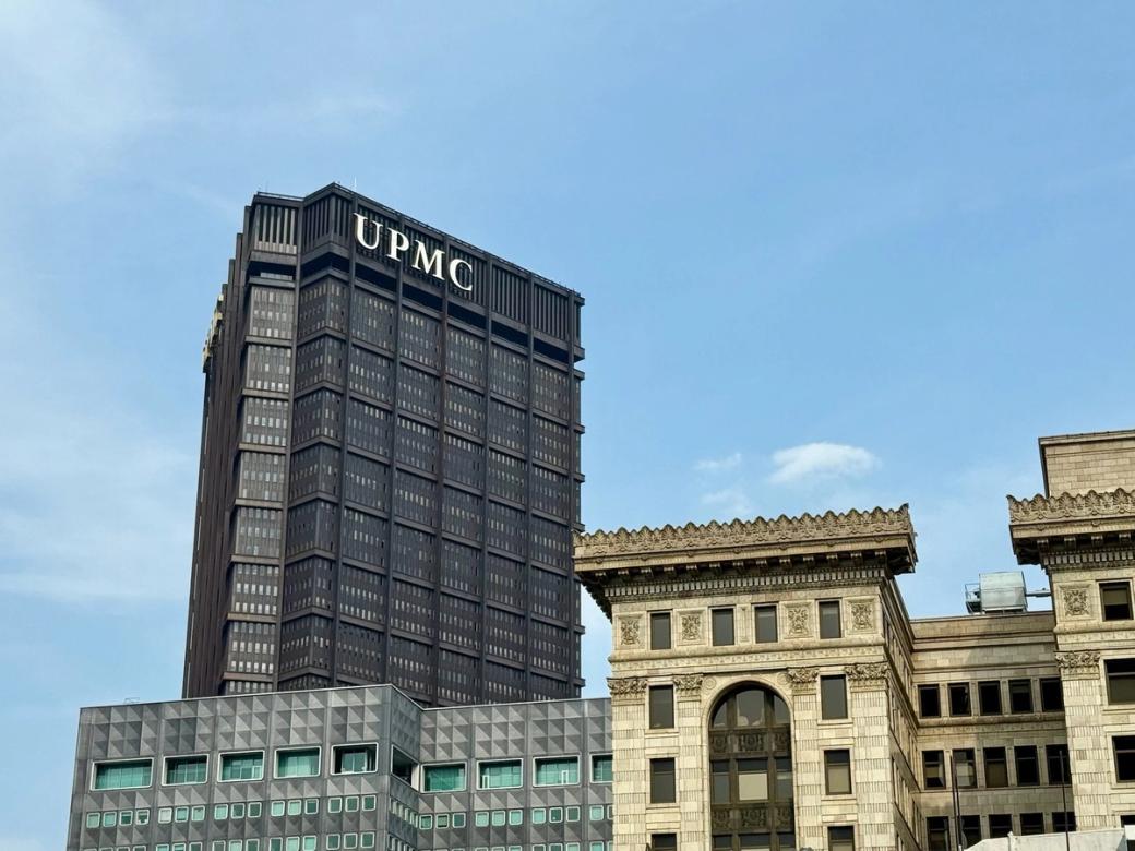 The UPMC building during a sunny day.