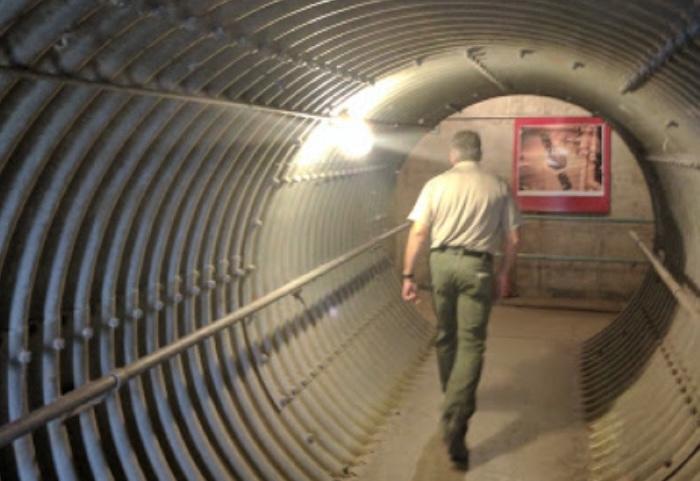 a man walks through the abandoned tunnels of the Atlas E. Missile Site in Greeley.