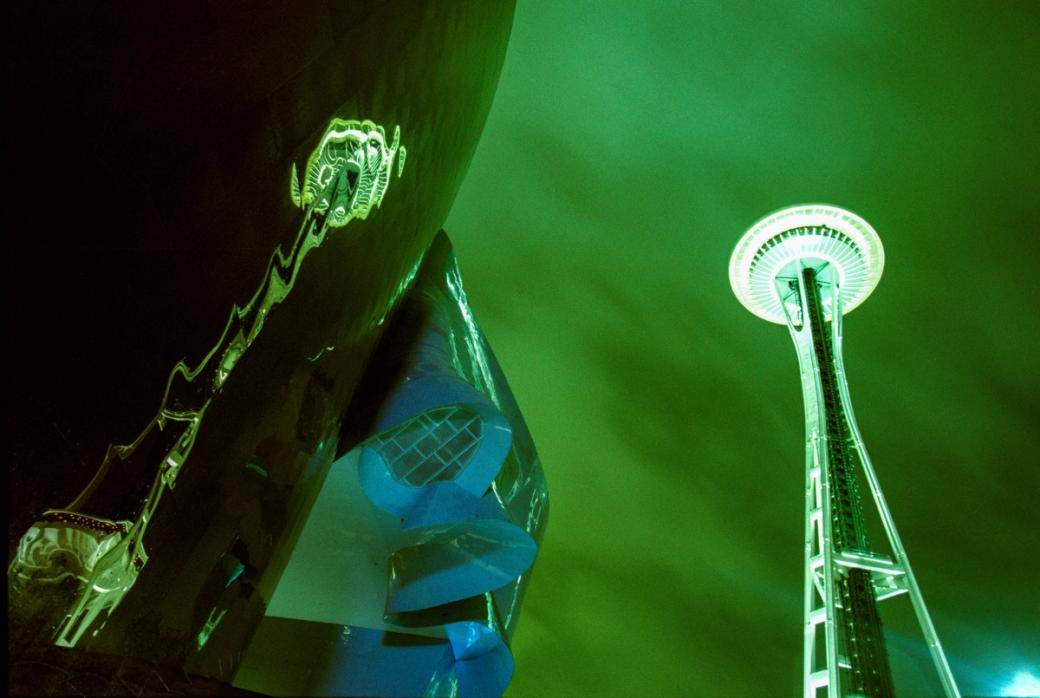An eerie reflection of the Space Needle in the metal panels of the Experience Music Project. This is a cross processed slide film which tweaks the color spectrum and infuses greens and blues into the exposure.