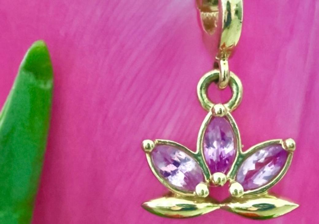 Display ad for Beaumont Jewelry: lotus charm