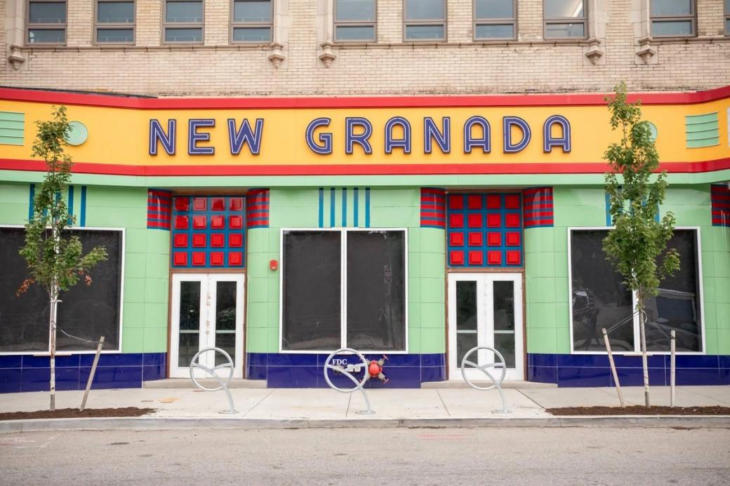 The colorful facade of the historic New Granada Theater.