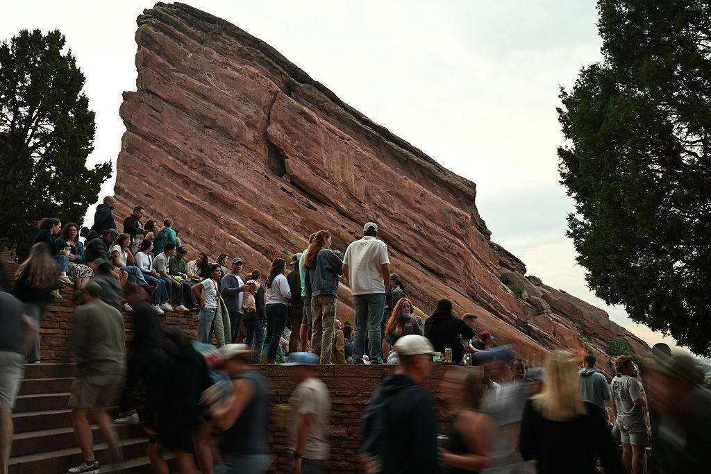 Concertgoers walk to their seats ahead of a concert at Red Rocks Amphitheatre.