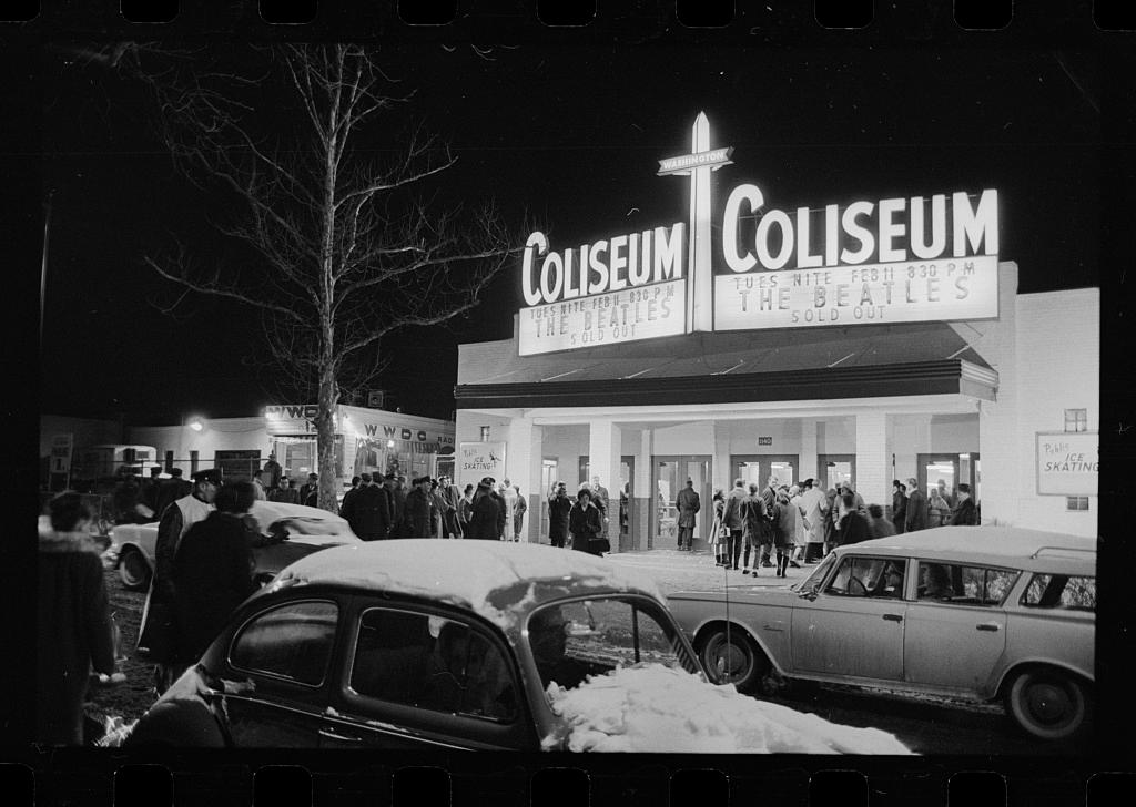 The Beatles putting on their show at the Washington Coliseum