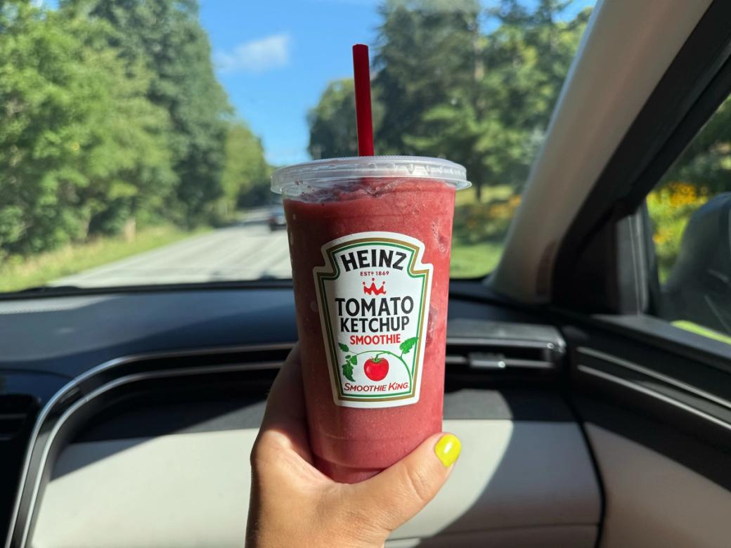 pinkish red smoothie cup with a Heinz ketchup inspired label