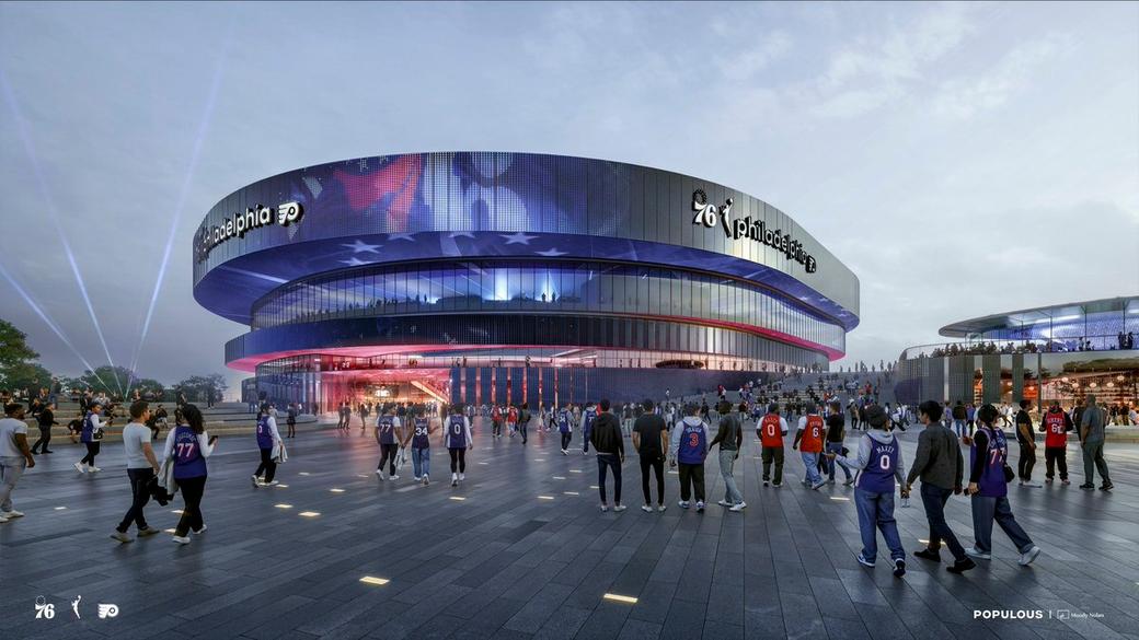 A rendering of the proposed new arena in South Philadelphia for the 76ers, Flyers, and Philadelphia's future WNBA team, showing a dramatic circular building wrapped in LED displays bearing team logos, with fans in jerseys streaming toward the entrance at dusk.